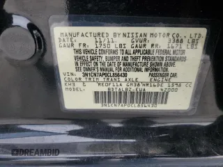 2012 Nissan Versa SV with VIN 3N1CN7AP0CL856430, listed as a Copart auction lot 70993634 with 97,853 mi miles and Salvage Title. Bid and sale history available at carsss.com. Image 13.
