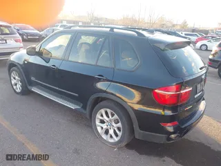 2011 BMW X5 35i with VIN 5UXZV4C54BL402935, listed as a IAAI auction lot 41198827 with 120,157 mi miles. Bid and sale history available at carsss.com. Image 3.