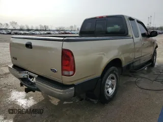 2000 Ford F-150 XL with VIN 2FTRX17W0YCA73568, listed as a Copart auction lot 51128035 with 208,737 mi miles and Salvage Title. Bid and sale history available at carsss.com. Image 3.