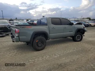 2023 Toyota Tacoma SR z VIN 3TMCZ5AN7PM593826, wystawiony jako Copart lot #50483285 z przebiegiem 14 957 mil mil oraz Szkoda całkowita • Salvage title. Historia ofert i sprzedaży dostępna na DreamBid. Obrazek 3.