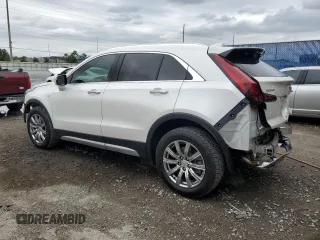 2023 Cadillac XT4 FWD Premium Luxury z VIN 1GYFZCR44PF105116, wystawiony jako Copart lot #51945915 z przebiegiem 20 669 mil mil oraz Szkoda całkowita • Salvage title. Historia ofert i sprzedaży dostępna na DreamBid. Obrazek 2.