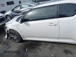 2014 Scion tC z VIN JTKJF5C77E3082073, wystawiony jako IAAI lot #42107615 z przebiegiem 223 895 mil mil oraz . Historia ofert i sprzedaży dostępna na DreamBid. Obrazek 14.