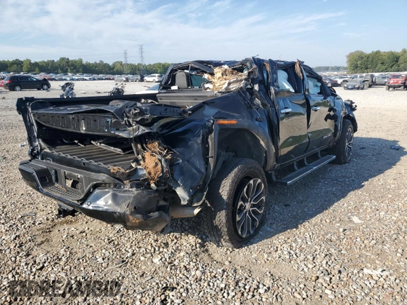 2023 GMC Canyon 4WD Denali with VIN 1GTP6FEK6P1263009, listed as a Copart auction lot 71101004 with 0 mi miles and Salvage Title. Bid and sale history available at carsss.com. Image 3.