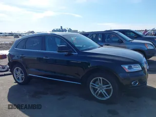 2016 Audi Q5 Premium Plus with VIN WA1L2AFP6GA038817, listed as a IAAI auction lot 41763474 with 75,490 mi miles. Bid and sale history available at carsss.com. Image 14.
