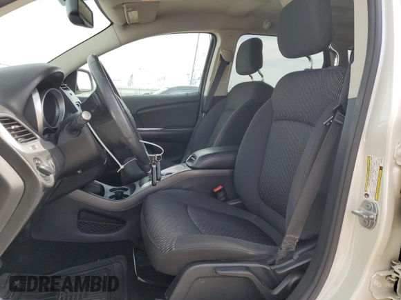 2017 Dodge Journey SE with VIN 3C4PDCAB2HT675948, listed as a Copart auction lot 54778875 with 84,544 mi miles and Salvage Title. Bid and sale history available at DreamBid. Image 7.