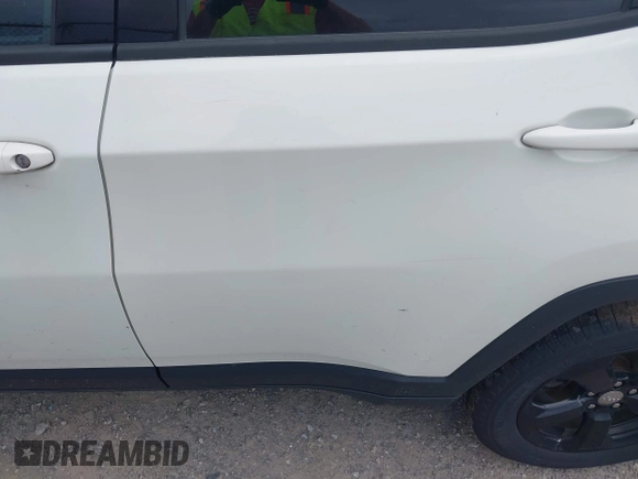 2019 Jeep Compass Latitude with VIN 3C4NJDBB8KT684116, listed as a IAAI auction lot 42596469 with 73,219 mi miles and . Bid and sale history available at DreamBid. Image 6.