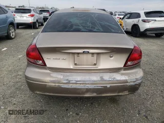 2004 Ford Taurus SE with VIN 1FAFP53U34G129631, listed as a Copart auction lot 45054375 with 182,089 mi miles and Salvage title. Bid and sale history available at DreamBid. Image 6.
