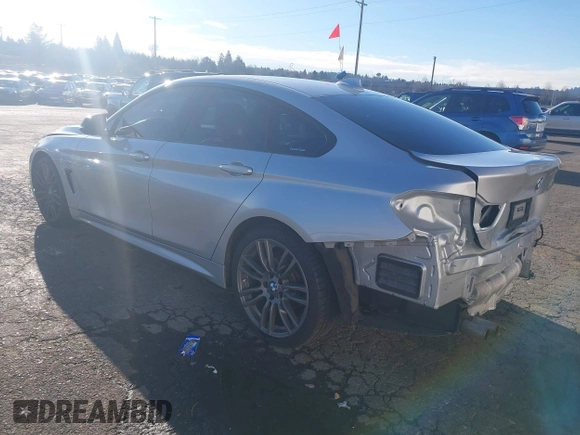 2015 BMW 4 Series 428i with VIN WBA4A5C58FG051293, listed as a IAAI auction lot 41255541 with 60,737 mi miles and . Bid and sale history available at DreamBid. Image 3.