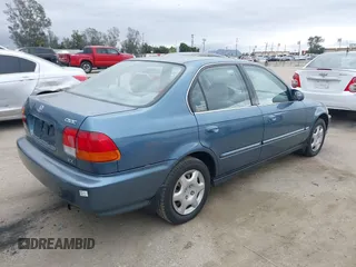 1998 Honda Civic EX with VIN JHMEJ8644WS002096, listed as a IAAI auction lot 41828342 with 184,283 mi miles. Bid and sale history available at carsss.com. Image 4.