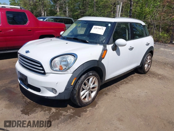 2013 MINI Countryman with VIN WMWZB3C56DWR36117, listed as a IAAI auction lot 42076676 with 168,750 mi miles and . Bid and sale history available at DreamBid. Image 2.