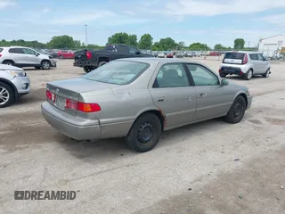 2001 Toyota Camry CE z VIN 4T1BG22K81U072844, wystawiony jako IAAI lot #42345527 z przebiegiem 152 059 mil mil oraz . Historia ofert i sprzedaży dostępna na DreamBid. Obrazek 4.