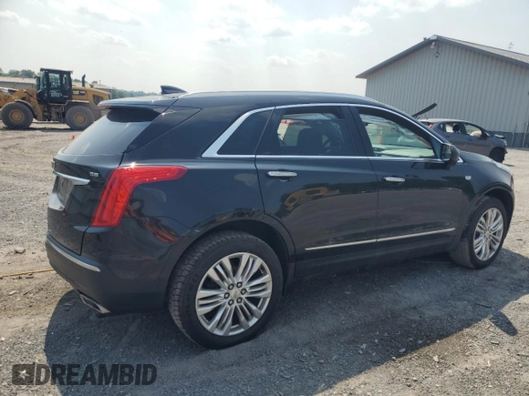 2019 Cadillac XT5 Premium Luxury AWD with VIN 1GYKNFRS9KZ223065, listed as a Copart auction lot 60902645 with 101,168 mi miles and Salvage title. Bid and sale history available at DreamBid. Image 3.