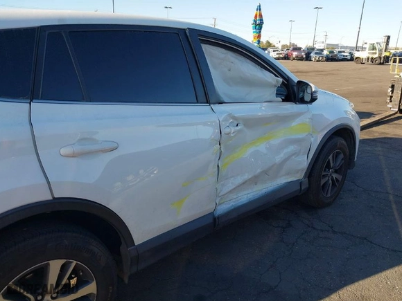 2018 Toyota RAV4 XLE with VIN JTMWFREV1JJ151684, listed as a IAAI auction lot 41745711 with 122,139 mi miles. Bid and sale history available at carsss.com. Image 6.