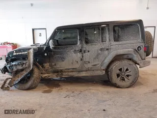 2020 Jeep Wrangler Unlimited Sport Altitude with VIN 1C4HJXDG4LW120627, listed as a IAAI auction lot 41728593 with 63,565 mi miles. Bid and sale history available at carsss.com. Image 14.