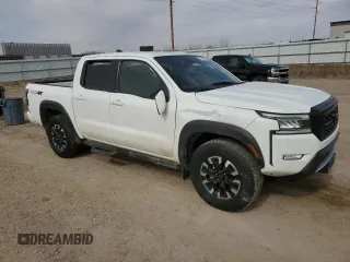 2022 Nissan Frontier Pro-4X z VIN 1N6ED1EK0NN668348, wystawiony jako Copart lot #52364335 z przebiegiem 50 861 mil mil oraz Szkoda całkowita • Salvage title. Historia ofert i sprzedaży dostępna na DreamBid. Obrazek 4.
