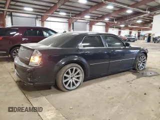 2006 Chrysler 300 C SRT8 with VIN 2C3LA73WX6H106631, listed as a Copart auction lot 50715715 with 104,990 mi miles and Clean Title. Bid and sale history available at carsss.com. Image 3.