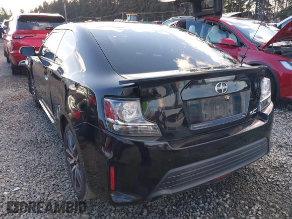 2015 Scion tC z VIN JTKJF5C74FJ010874, wystawiony jako IAAI lot #41496551 z przebiegiem 132 586 mil mil oraz . Historia ofert i sprzedaży dostępna na DreamBid. Obrazek 3.
