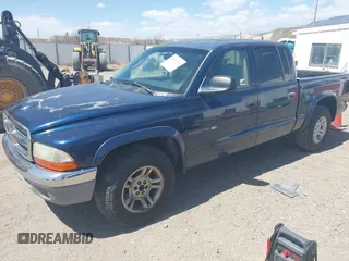2002 Dodge Dakota SLT with VIN 1B7HL48N32S708719, listed as a IAAI auction lot 42027763 with 217,797 mi miles. Bid and sale history available at carsss.com. Image 2.