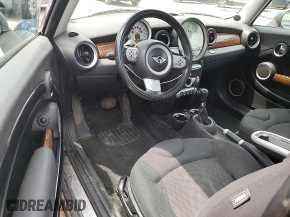 2007 MINI Hardtop with VIN WMWMF33537TL77985, listed as a Copart auction lot 61908635 with 180,470 mi miles and Salvage title. Bid and sale history available at DreamBid. Image 8.