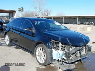 2014 Toyota Avalon Limited with VIN 4T1BK1EB9EU131698, listed as a IAAI auction lot 41811791 with 95,527 mi miles. Bid and sale history available at carsss.com. Image 1.