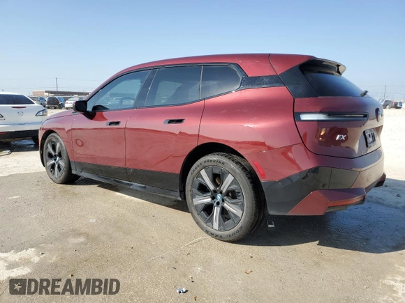 2024 BMW iX xDrive50 z VIN WB523CF06RCN03726, wystawiony jako Copart lot #48911045 z przebiegiem 38 051 mil mil oraz Szkody całkowita. Historia ofert i sprzedaży dostępna na DreamBid. Obrazek 2.