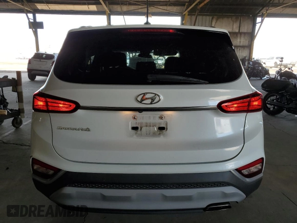 2019 Hyundai Santa Fe SE z VIN 5NMS23AD4KH038484, wystawiony jako Copart lot #59189315 z przebiegiem 69 900 mil mil oraz Szkoda całkowita • Salvage title. Historia ofert i sprzedaży dostępna na DreamBid. Obrazek 6.