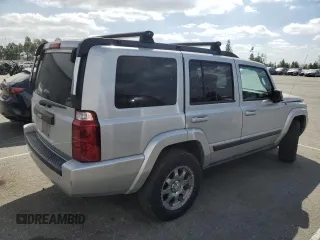 2007 Jeep Commander Sport z VIN 1J8HG48K97C505712, wystawiony jako Copart lot #72011114 z przebiegiem 146 981 mil mil oraz Szkoda całkowita • Salvage title. Historia ofert i sprzedaży dostępna na DreamBid. Obrazek 3.