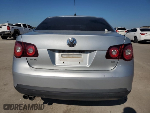 2009 Volkswagen Jetta S z VIN 3VWJM71K79M167562, wystawiony jako Copart lot #80546594 z przebiegiem 196 891 mil mil oraz Szkoda całkowita • Salvage title. Historia ofert i sprzedaży dostępna na DreamBid. Obrazek 6.