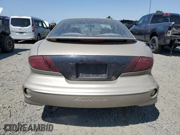 2002 Pontiac Sunfire SE z VIN 1G2JB124327288986, wystawiony jako Copart lot #64072634 z przebiegiem 122 306 mil mil oraz Szkody całkowita. Historia ofert i sprzedaży dostępna na DreamBid. Obrazek 6.