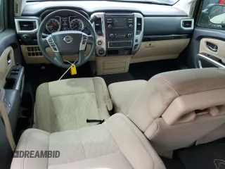 2017 Nissan Titan SV z VIN 1N6AA1EJ2HN570490, wystawiony jako Copart lot #50688785 z przebiegiem 122 817 mil mil oraz Szkoda całkowita • Salvage title. Historia ofert i sprzedaży dostępna na DreamBid. Obrazek 8.