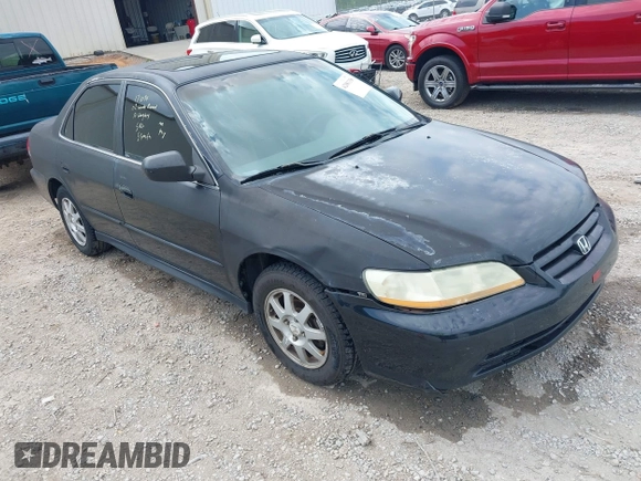 2002 Honda Accord SE z VIN 1HGCG668X2A171099, wystawiony jako IAAI lot #42081358 z przebiegiem 215 915 mil mil oraz . Historia ofert i sprzedaży dostępna na DreamBid. Obrazek 1.