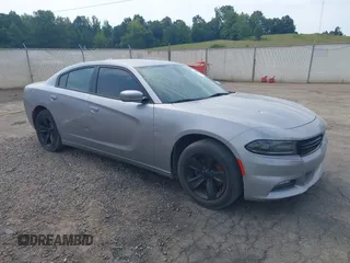 2017 Dodge Charger SXT with VIN 2C3CDXHG5HH612332, listed as a IAAI auction lot 40118824 with 152,836 mi miles and . Bid and sale history available at carsss.com. Image 1.