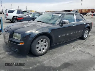 2005 Chrysler 300 Touring z VIN 2C3JA53G75H614560, wystawiony jako Copart lot #59851205 z przebiegiem 194 573 mil mil oraz Szkoda całkowita • Salvage title. Historia ofert i sprzedaży dostępna na DreamBid. Obrazek 1.