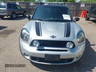 2014 MINI Countryman S with VIN WMWZC5C52EWP36667, listed as a IAAI auction lot 42541120 with 149,331 mi miles and . Bid and sale history available at DreamBid. Image 6.