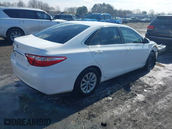 2016 Toyota Camry XLE with VIN 4T1BF1FK1GU155709, listed as a IAAI auction lot 41556465 with 159,923 mi miles and . Bid and sale history available at DreamBid. Image 4.