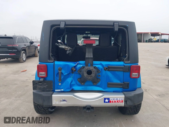 2014 Jeep Wrangler Arctic z VIN 1C4GJWBG3EL313350, wystawiony jako IAAI lot #41442520 z przebiegiem Nie podano mil oraz . Historia ofert i sprzedaży dostępna na DreamBid. Obrazek 16.