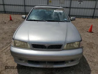 1999 Infiniti G20 z VIN JNKCP11A8XT015021, wystawiony jako Copart lot #67966844 z przebiegiem 268 922 mil mil oraz Szkody całkowita. Historia ofert i sprzedaży dostępna na DreamBid. Obrazek 5.