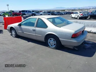 1995 Ford Thunderbird LX with VIN 1FALP62W4SH127020, listed as a IAAI auction lot 41823705 with 199,600 mi miles and . Bid and sale history available at DreamBid. Image 3.