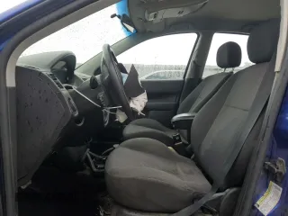 2005 Ford Focus S with VIN 3FAFP37N35R156460, listed as a Copart auction lot 58781635 with 231,066 mi miles and Salvage title. Bid and sale history available at DreamBid. Image 7.