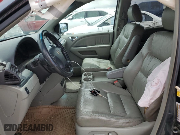 2006 Honda Odyssey EX-L z VIN 5FNRL38786B014188, wystawiony jako Copart lot #57140935 z przebiegiem Nie podano mil oraz Szkoda całkowita • Salvage title. Historia ofert i sprzedaży dostępna na DreamBid. Obrazek 7.