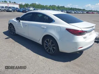 2016 Mazda Mazda6 i Grand Touring with VIN JM1GJ1W55G1443186, listed as a IAAI auction lot 42063716 with 114,263 mi miles. Bid and sale history available at carsss.com. Image 3.