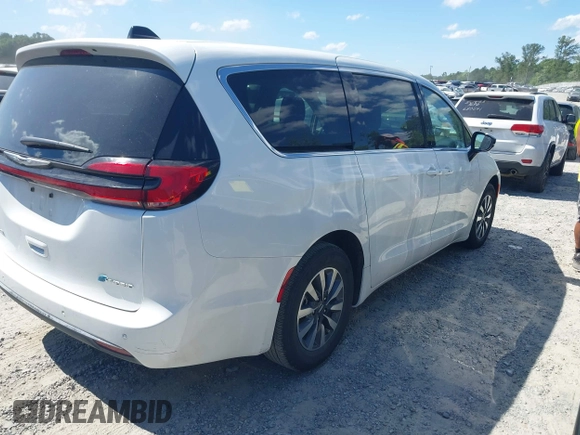 2024 Chrysler Pacifica Hybrid Select z VIN 2C4RC1S72RR117788, wystawiony jako IAAI lot #42318543 z przebiegiem 21 855 mil mil oraz . Historia ofert i sprzedaży dostępna na DreamBid. Obrazek 4.