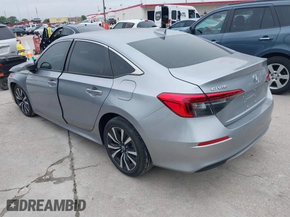 2023 Honda Civic EX with VIN 2HGFE1F77PH321210, listed as a IAAI auction lot 42379950 with Not provided miles and . Bid and sale history available at DreamBid. Image 3.
