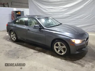 2015 BMW 3 Series 320i xDrive with VIN WBA3C3C52FP664472, listed as a Copart auction lot 55647585 with 129,934 mi miles and Salvage title. Bid and sale history available at DreamBid. Image 4.