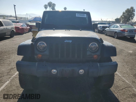 2012 Jeep Wrangler Unlimited Rubicon with VIN 1C4HJWFG9CL276753, listed as a Copart auction lot 62996995 with 234,159 mi miles and Clean title. Bid and sale history available at DreamBid. Image 5.
