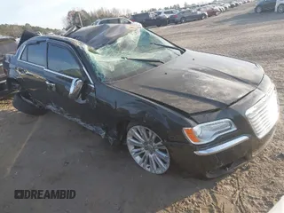 2014 Chrysler 300 with VIN 2C3CCAEGXEH120136, listed as a IAAI auction lot 41020040 with 125,887 mi miles. Bid and sale history available at carsss.com. Image 1.