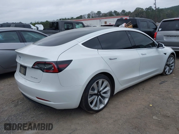 2020 Tesla Model 3 Long Range with VIN 5YJ3E1EB0LF703733, listed as a IAAI auction lot 41796732 with 75,027 mi miles. Bid and sale history available at carsss.com. Image 4.