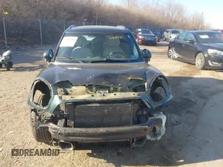 2012 MINI Countryman S with VIN WMWZC5C52CWL62574, listed as a IAAI auction lot 41768196 with 159,816 mi miles and . Bid and sale history available at DreamBid. Image 6.