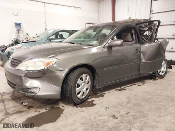 2004 Toyota Camry LE with VIN 4T1BE32K34U903876, listed as a IAAI auction lot 41373506 with 271,963 mi miles. Bid and sale history available at carsss.com. Image 19.