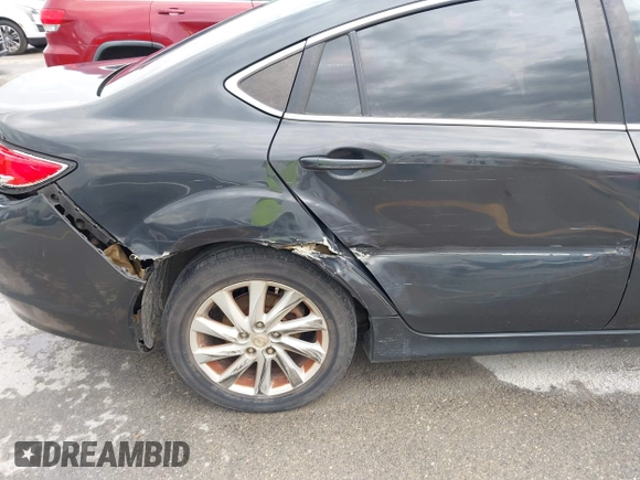 2012 Mazda 6 i Touring with VIN 1YVHZ8DH4C5M23169, listed as a IAAI auction lot 42467120 with 202,560 mi miles and . Bid and sale history available at DreamBid. Image 6.